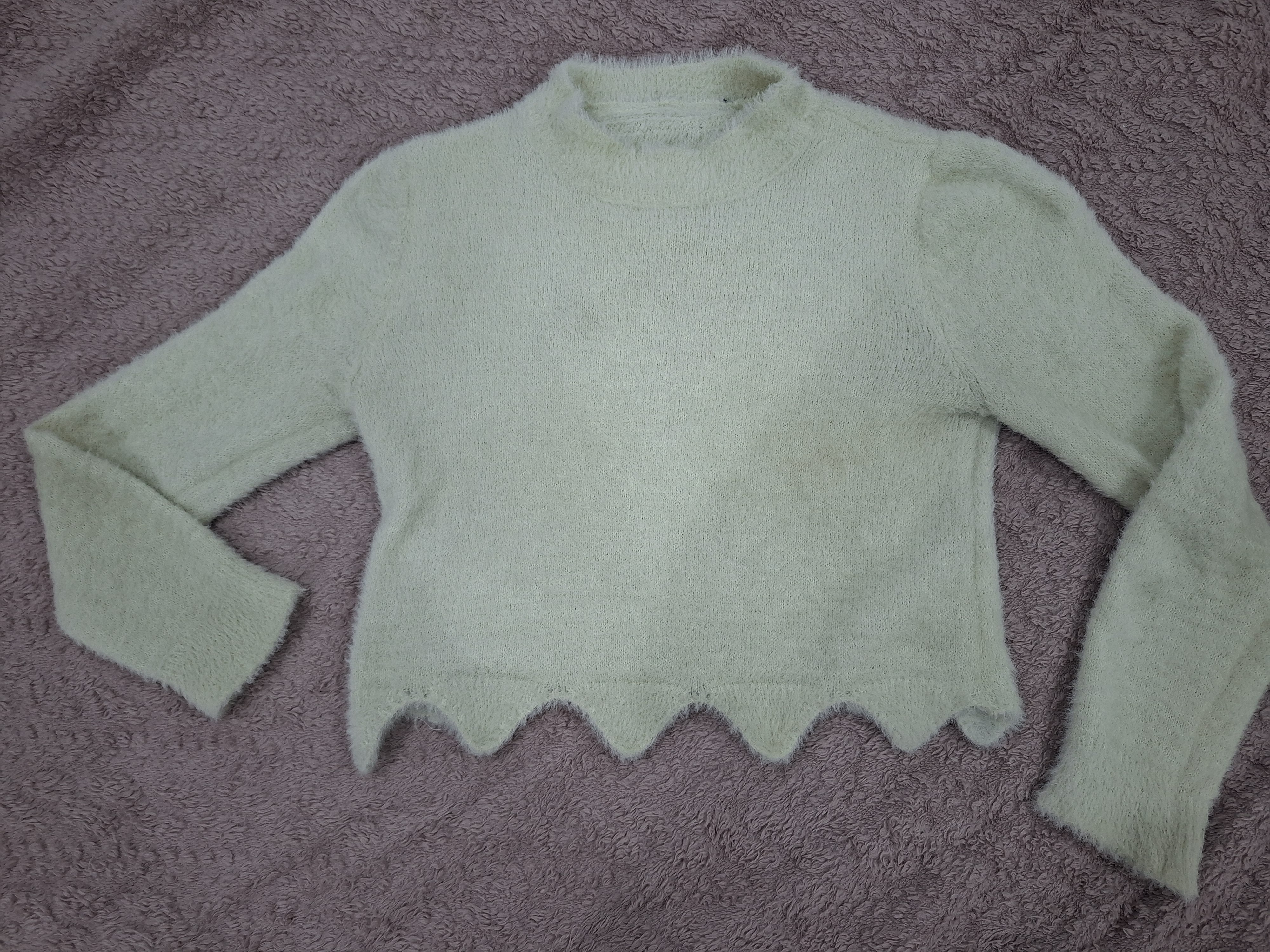 Pull en laine taille M